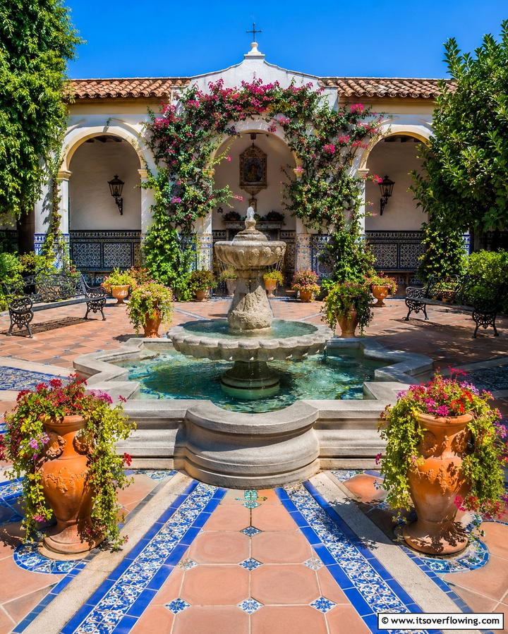 Central Fountain as a Focal Point - 20 Spanish Courtyard Ideas for a Serene Outdoor Space