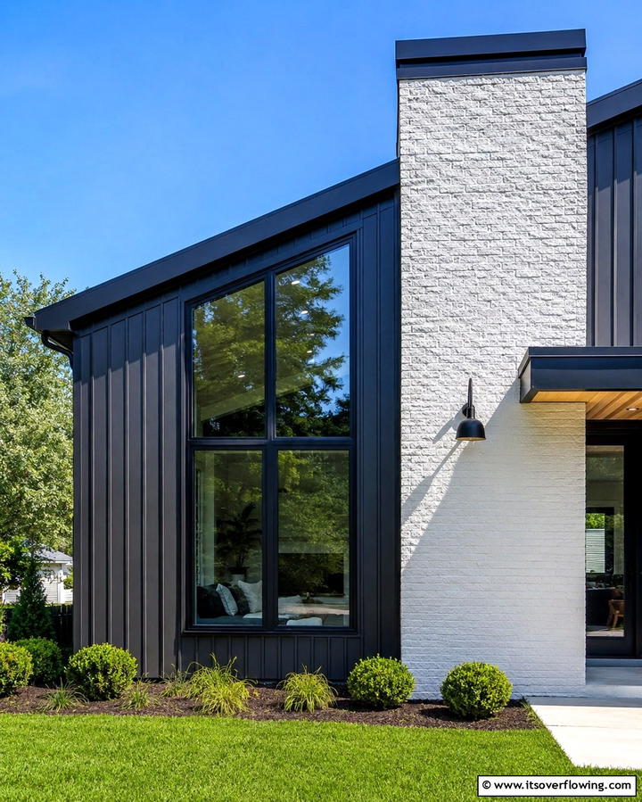 Charcoal Gray Vinyl with Light Gray Brick - 25 Vinyl Siding and Brick Combinations for Curb Appeal