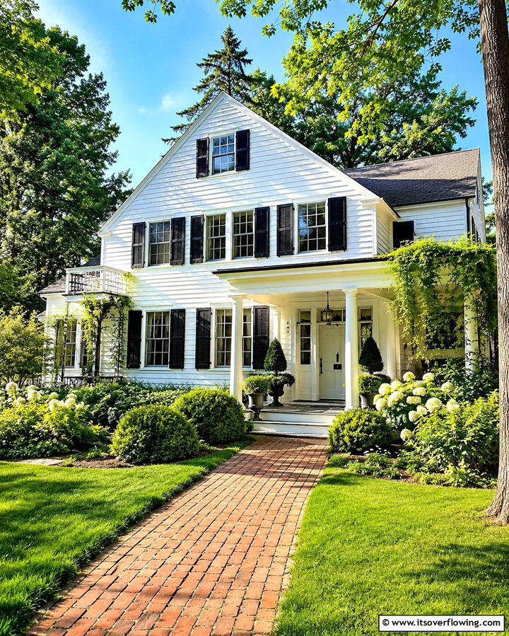 Charming White Farmhouse with Black Window Shutters - 25 White Farmhouse with Black Windows Ideas