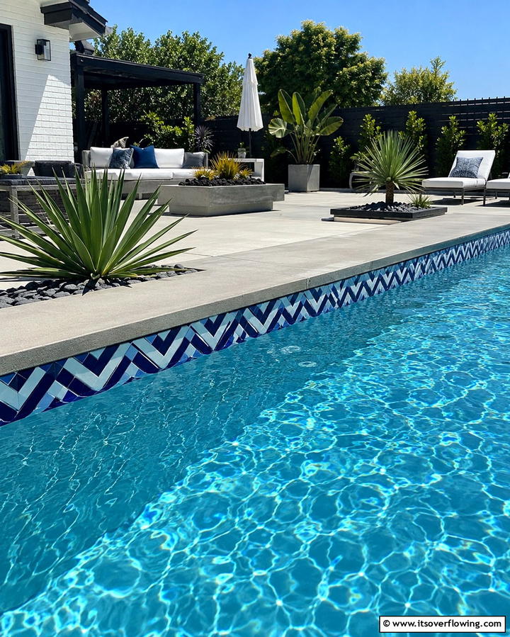 Chevron Pattern Tiles - 20 Waterline Pool Tile Ideas for a Stunning Backyard Oasis