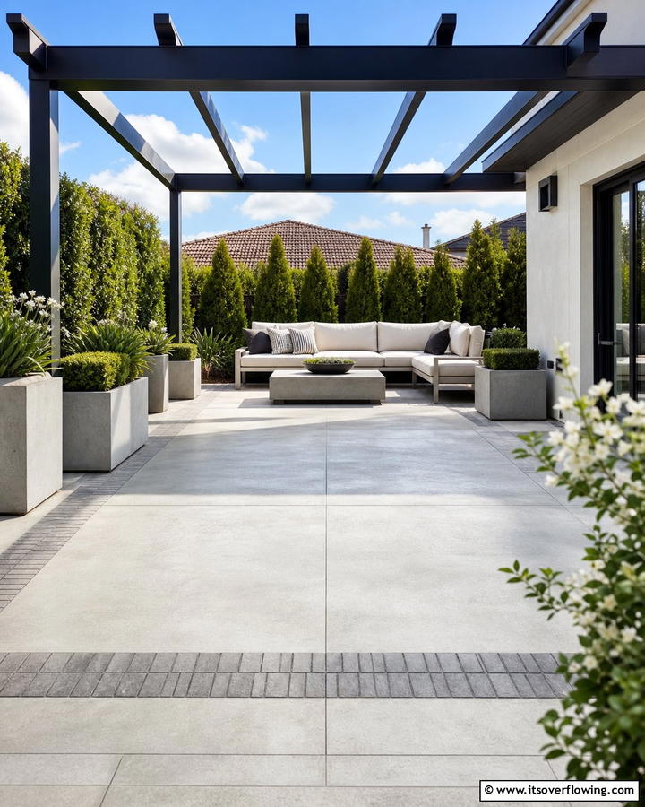 Classic Concrete Simplicity - 20 Pergola Flooring Ideas to Enhance Your Outdoor Space