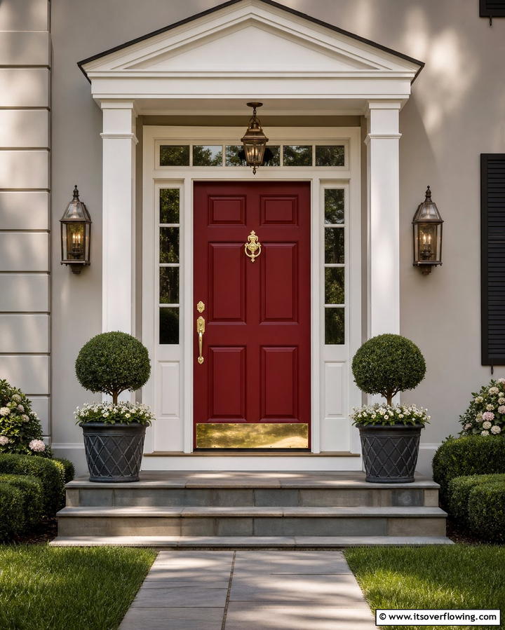 Classic Elegance with Dark Red and Brass Accents - 25 Dark Red Front Door Ideas for a Bold Entrance