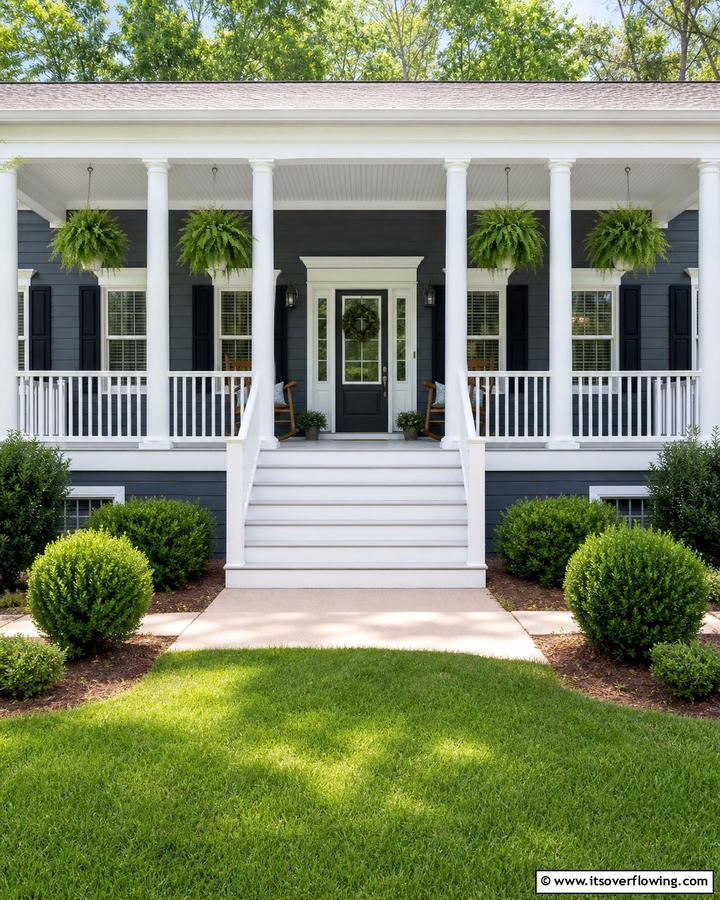 Classic White Columns and Railings - 20 Raised Ranch Front Porch Ideas for Curb Appeal