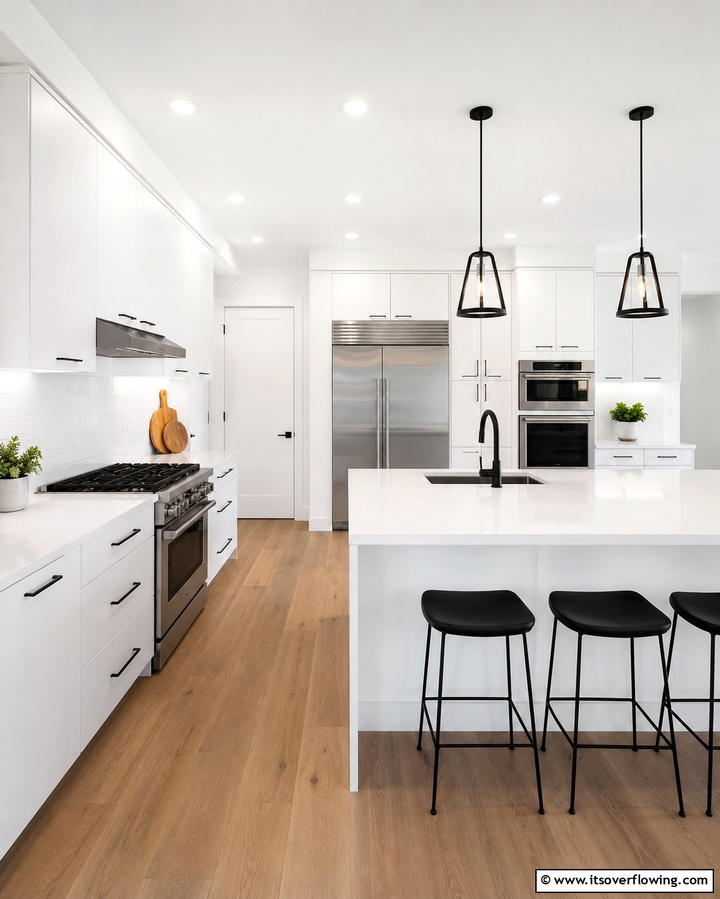 Clean and Organized Lines - 20 White Kitchen Cabinets With Black Hardware Ideas