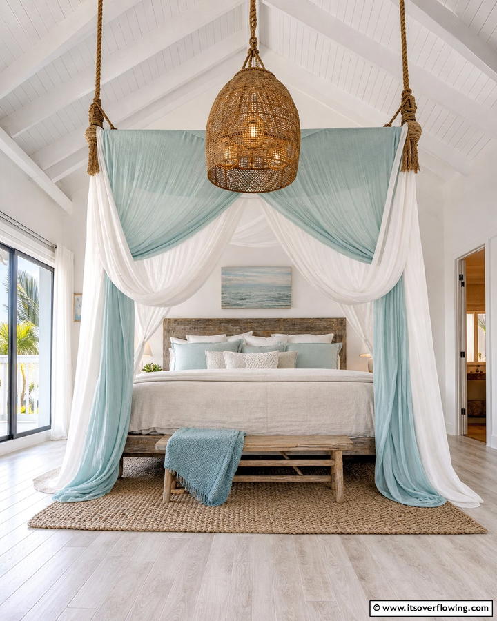 Coastal Canopy and Draped Fabrics - 21 Coastal Bedroom Ideas for Relaxing Beach Vibes