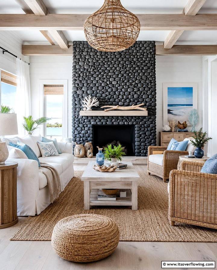 Coastal Vibes with Black Pebbled Stone - 25 Elegant Black Stone Fireplace Ideas