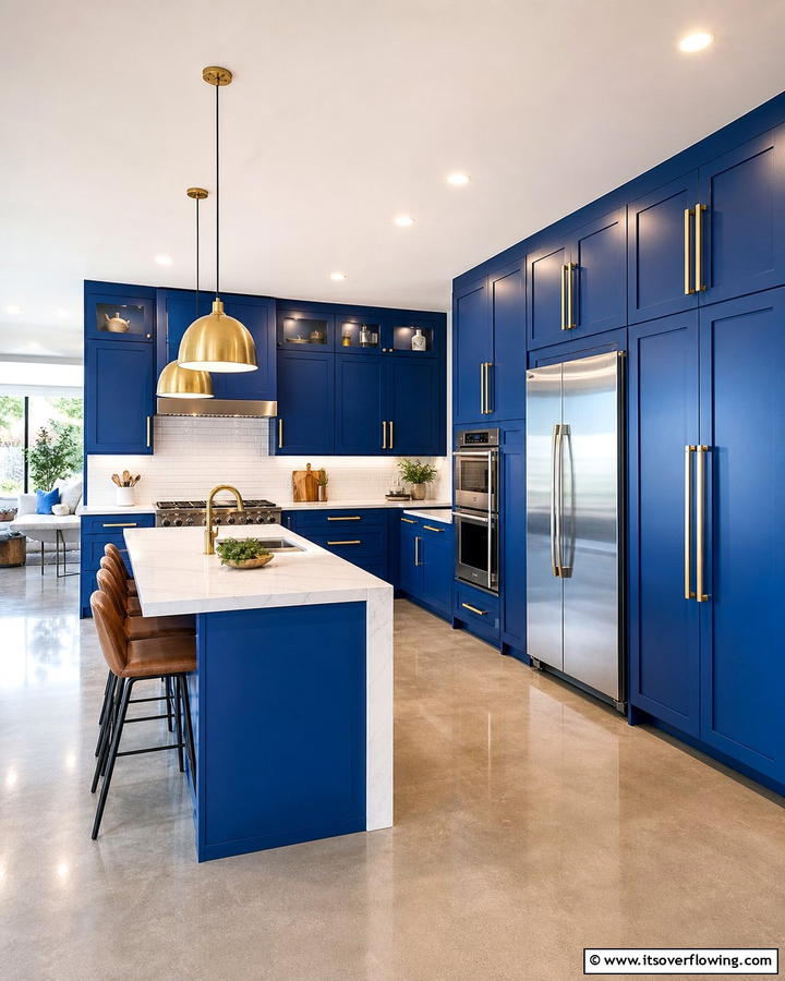 Cobalt Blue Cabinets with Oversized Gold Pulls - 25 Blue Kitchen Cabinets With Gold Hardware for a Luxe Look