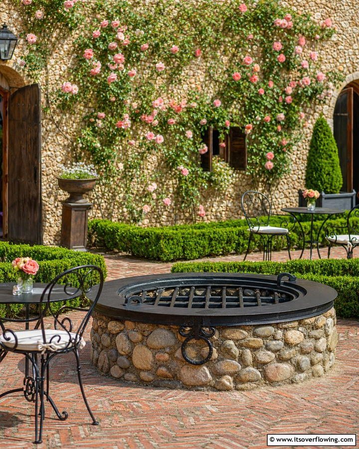 Cobblestone Fire Pit with Iron Accents - 25 Rock Fire Pit Ideas for Outdoor Gatherings