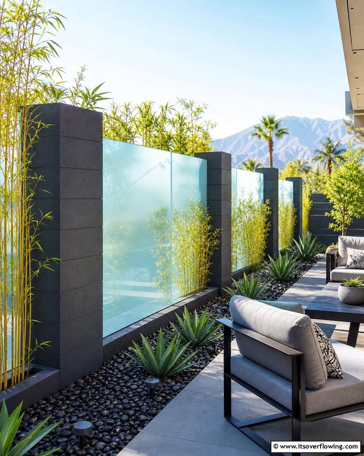 Concrete Block Fence with Glass Panels - 20 Concrete Block Fence Ideas for a Sturdy and Stylish Barrier