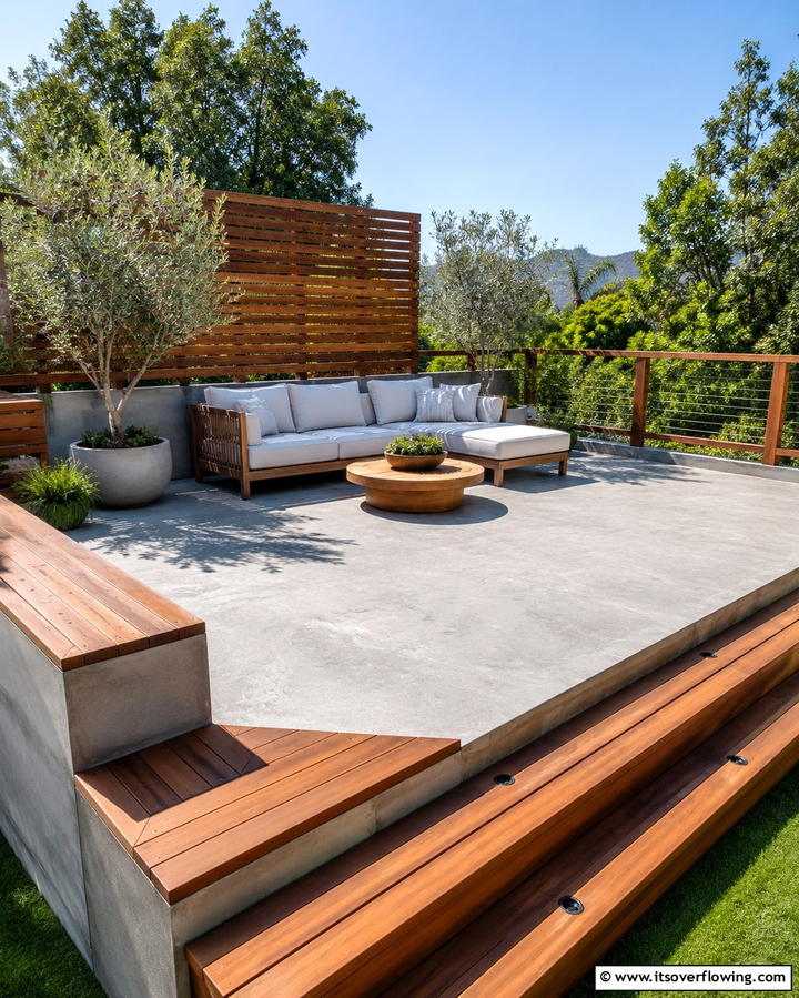 Concrete Decks with Wood Accents - 25 Concrete Deck Ideas for a Modern and Durable Outdoor Space