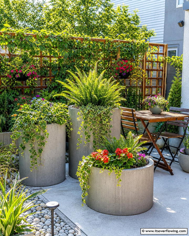 Concrete Planters for Green Accents - 25 Concrete Patio Ideas on a Budget for Affordable Style