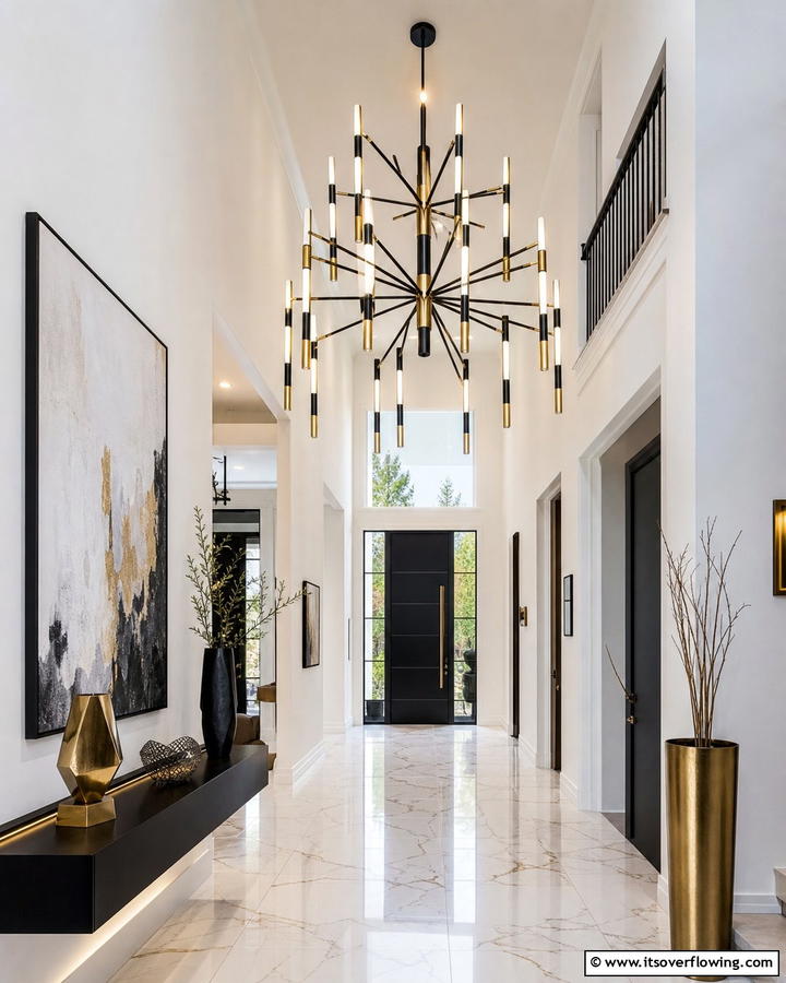 Contemporary Chandelier Statements - 21 Entryway Lighting Ideas to Brighten Your Foyer