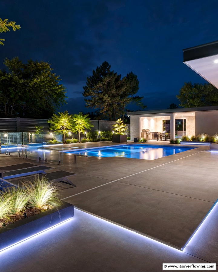 Contemporary Concrete Pool Deck with LED Lights - 21 Pool Deck Layouts for Safe & Stylish Swimming Areas