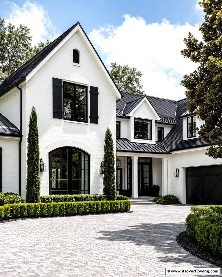 Contrasting Black and White Exterior - 25 Modern Black Houses for a Bold Statement