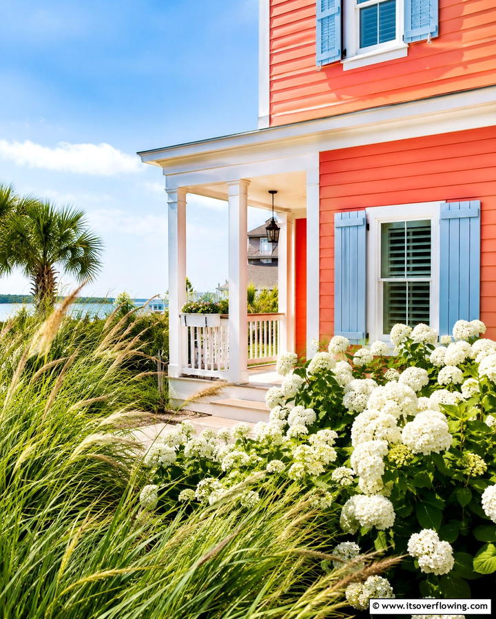 Coral Orange for a Refreshing Coastal Vibe - 25 Orange House Exterior Ideas for a Bold Look