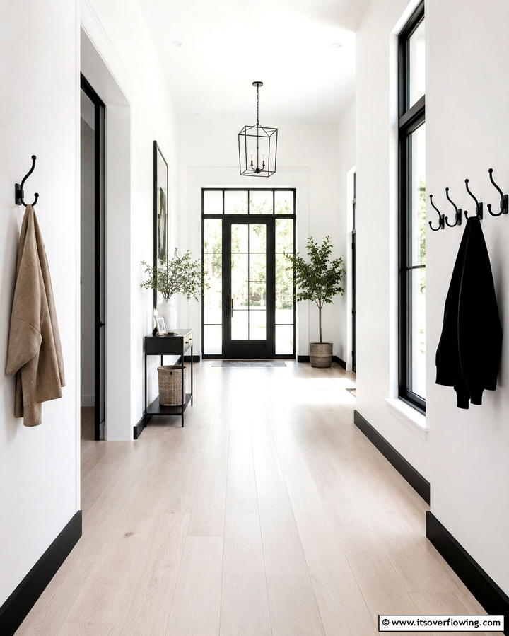 Crisp White Walls with Black Accents - 30 Chic Black and White Hallway Ideas for Timeless Elegance