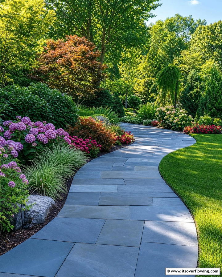 Curved Bluestone Walkway for a Dynamic Layout - 25 Bluestone Walkway Ideas for Your Garden