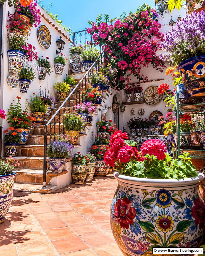 Decorative Ceramic Pots - 20 Spanish Courtyard Ideas for a Serene Outdoor Space