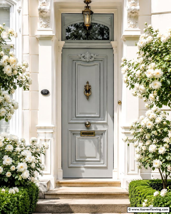 Dove Grey with Ornate Details - 25 Grey Front Door Ideas for a Chic and Modern Entryway