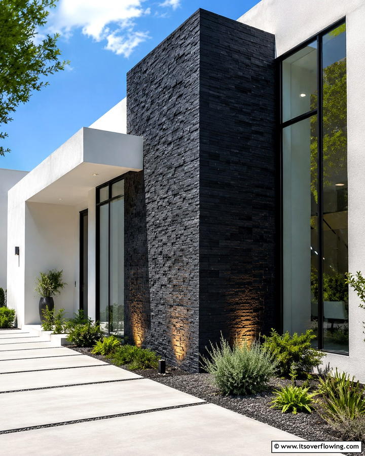 Dramatic Black Stone Accents - 25 Stone Exterior Home Ideas for a Timeless Look