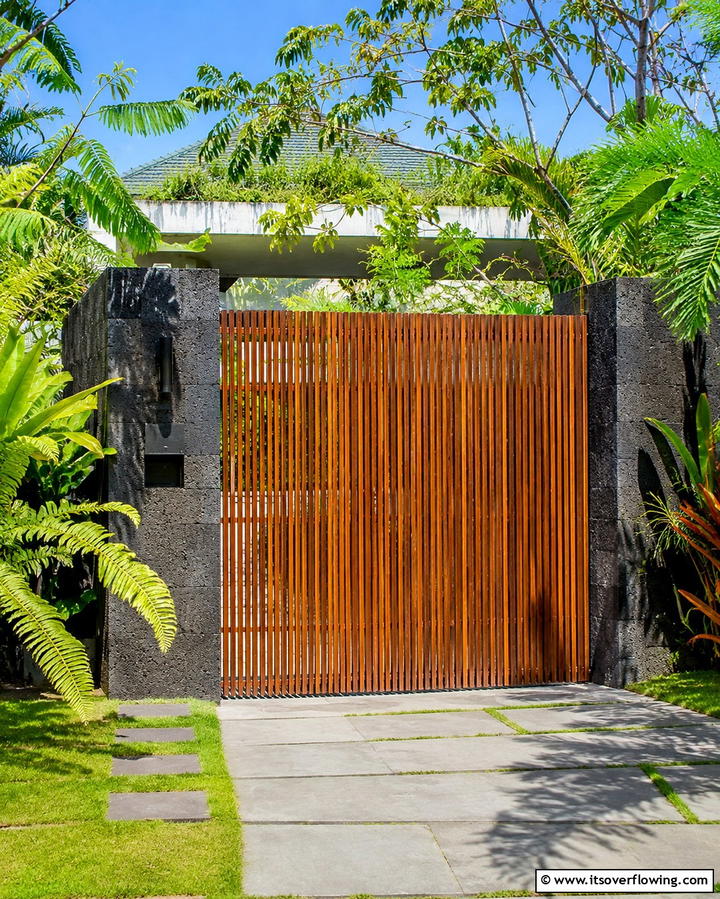 Elegant Vertical Wood Slats - 30 Stylish Driveway Gate Ideas for Curb Appeal