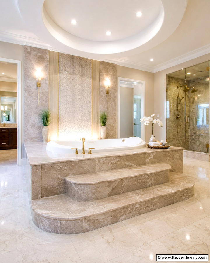 Elevated Drop In Tub with a Stone Surround - 25 Elegant Drop-in Tub Ideas for a Spa-Like Bathroom