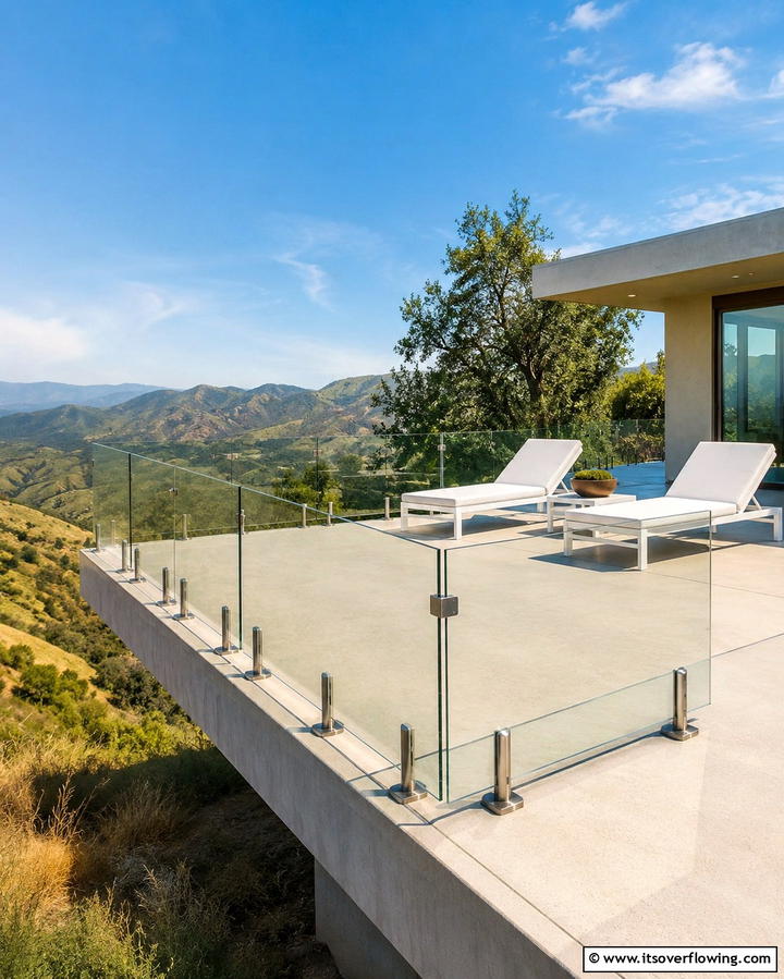 Elevated Patio with Modern Glass Railings - 25 Raised Concrete Patio Ideas for a Modern Outdoor Space