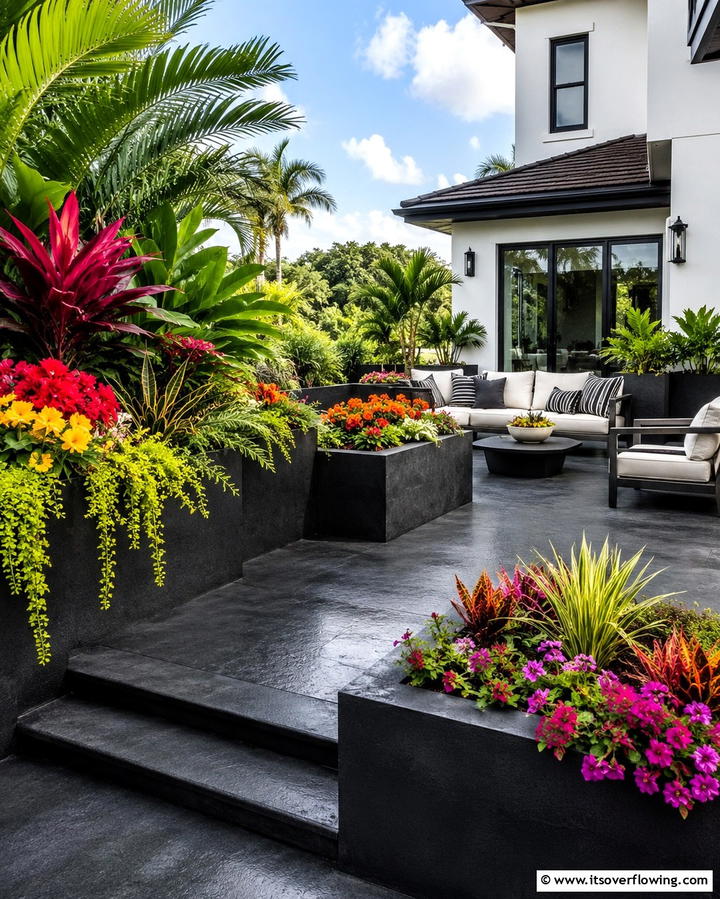 Elevating the Look with Built In Planters - 25 Black Concrete Patio Ideas for Modern Outdoor Spaces
