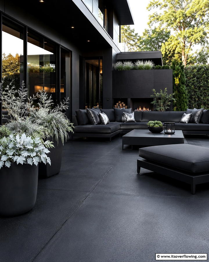 Embracing a Monochromatic Color Scheme - 25 Black Concrete Patio Ideas for Modern Outdoor Spaces