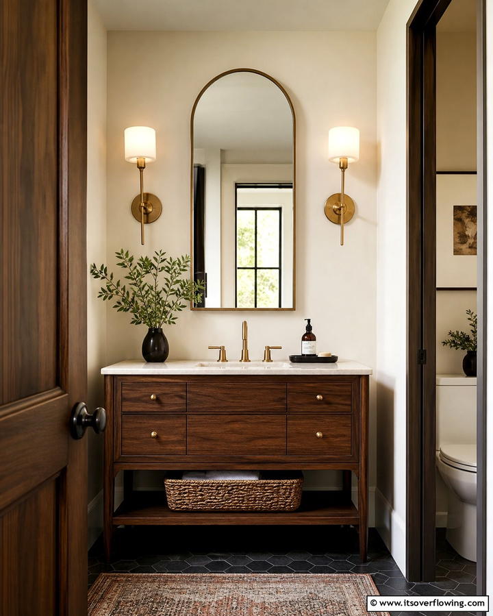 Enhance Lighting with Wall Sconces - 25 Guest Bathroom Ideas for a Welcoming Space