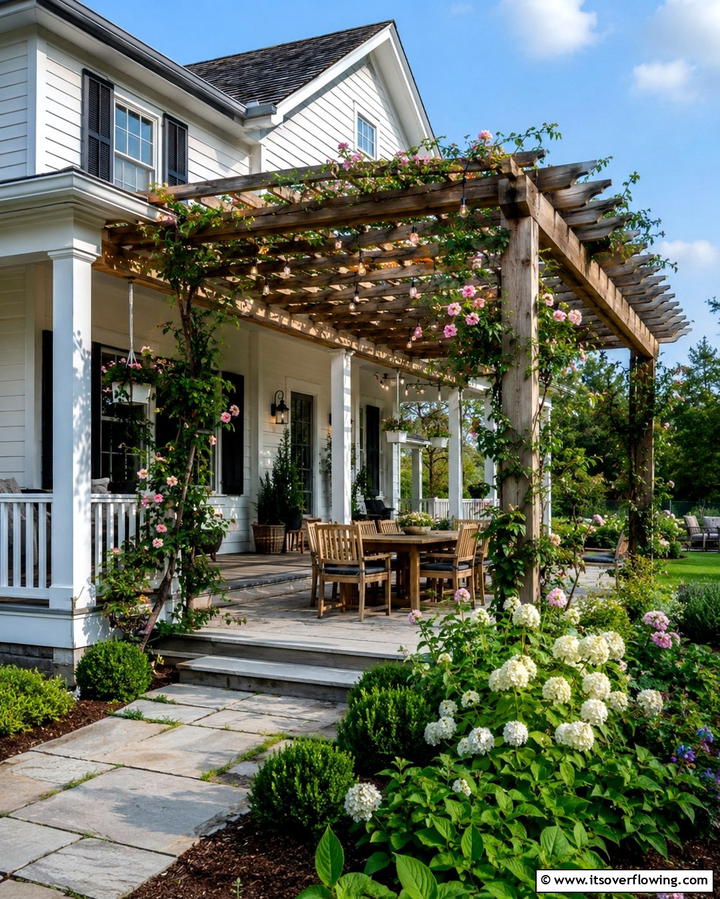 Farmhouse with Pergola Extension on the Porch - 20 White Farmhouse With Wrap-around Porch Ideas
