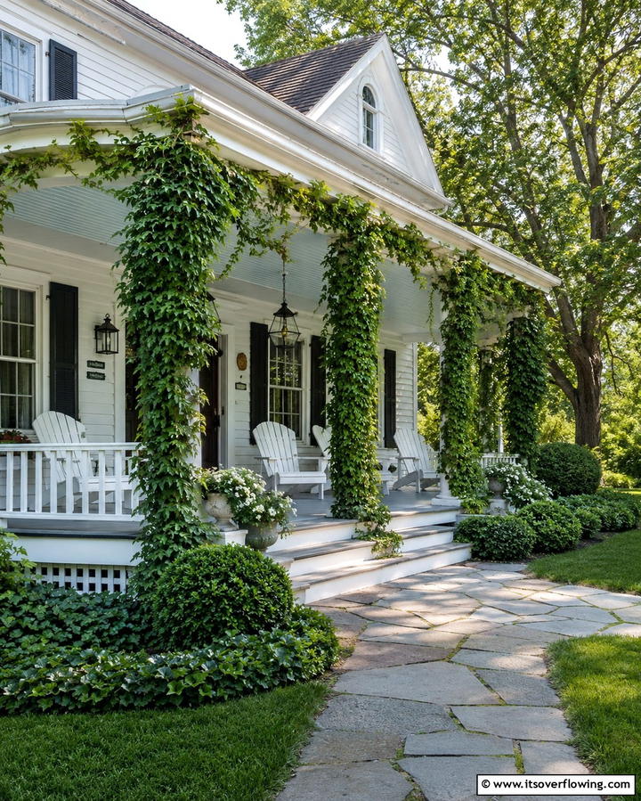 Farmhouse with Wrap around Porch and Ivy covered Columns - 20 White Farmhouse With Wrap-around Porch Ideas