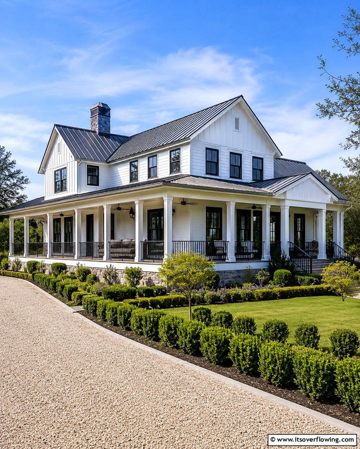 Farmhouse with a Metal Roof for Contrast - 20 White Farmhouse With Wrap-around Porch Ideas