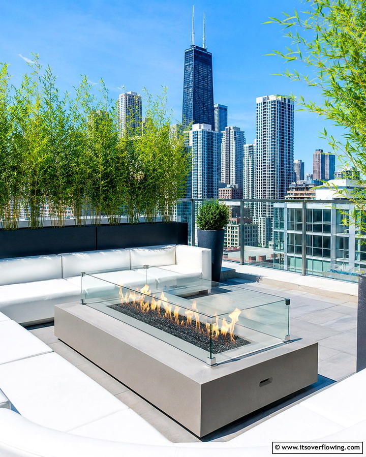Firepit with Glass Wind Guard - 25 Patio Ideas With Firepit for Cozy Gatherings