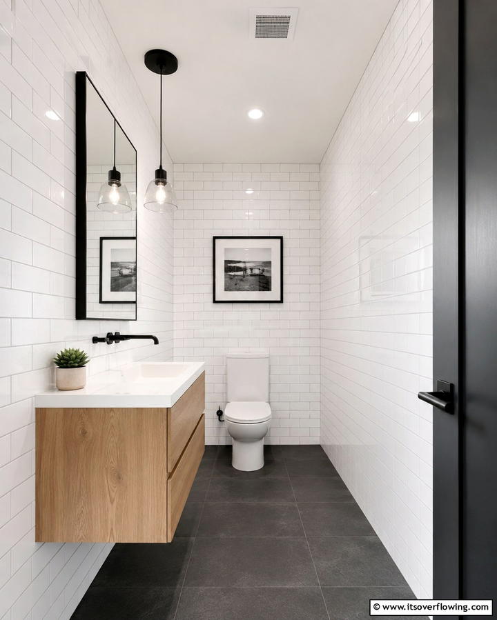 Floor to Ceiling Tiles - 25 Small Powder Room Ideas for Stylish Spaces