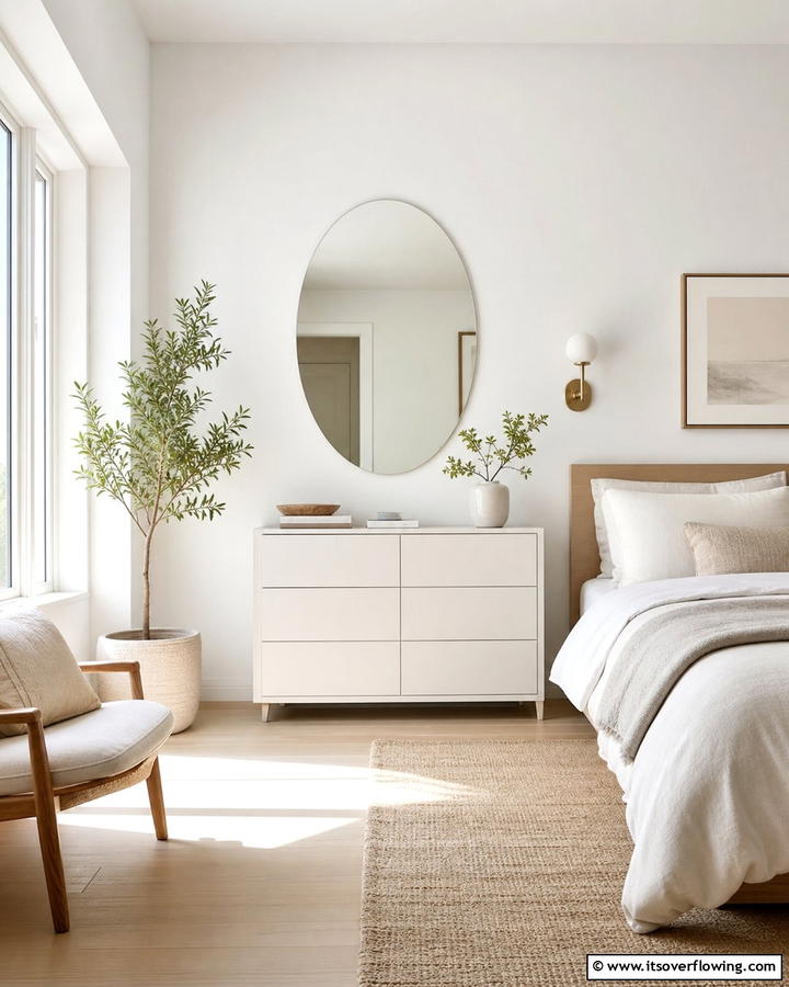 Frameless Oval Mirror for Subtle Sophistication - 20 Bedroom Mirror Ideas to Reflect Your Style