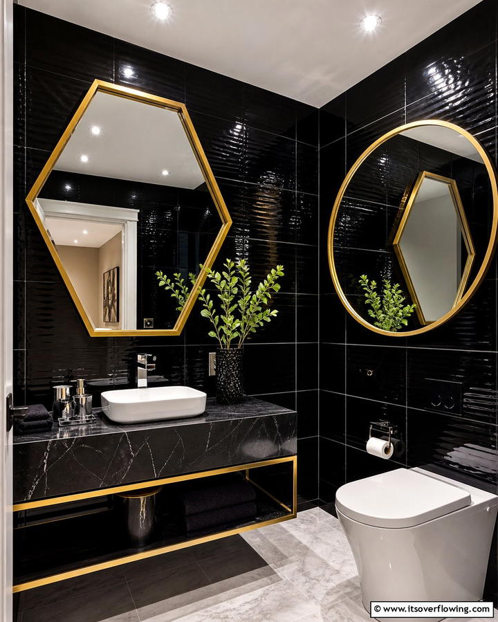 Geometric Gold Mirrors Against Black Tiles - 25 Luxurious Black and Gold Powder Room Ideas for Elegance