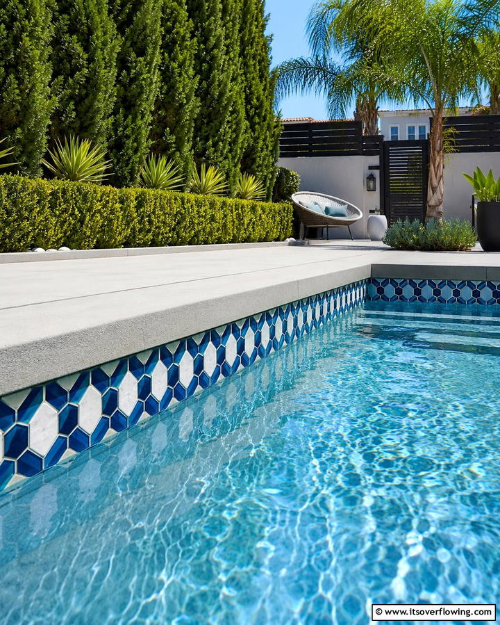 Geometric Patterned Tiles - 20 Waterline Pool Tile Ideas for a Stunning Backyard Oasis