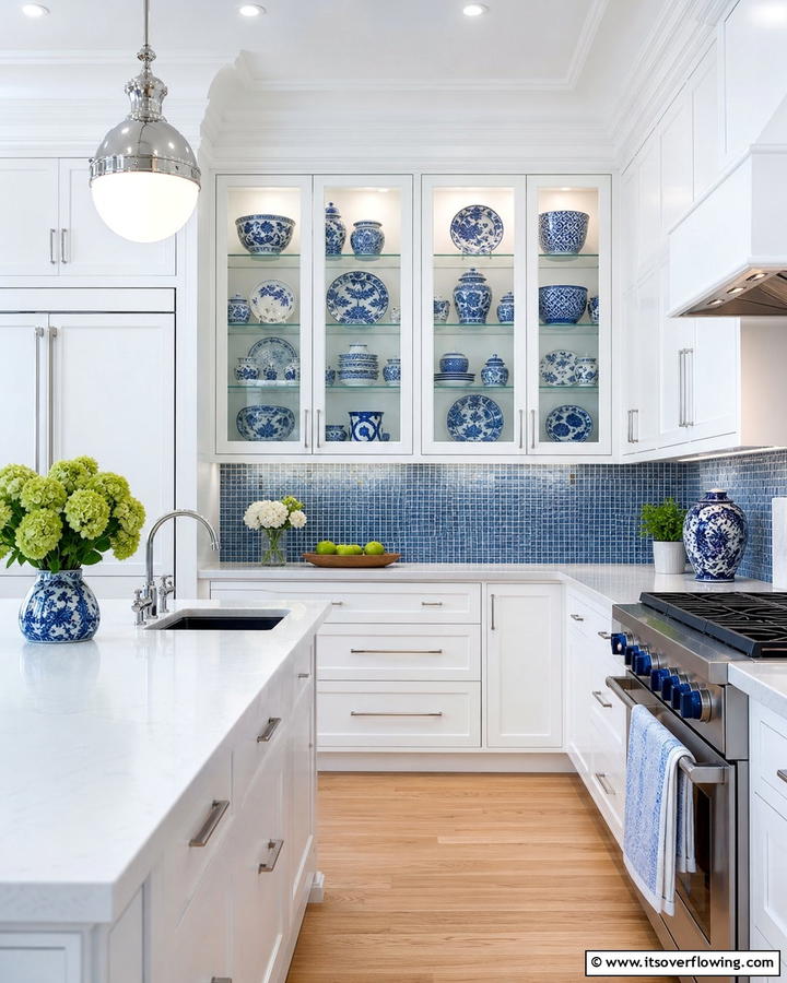 Glass Front Cabinets with Blue and White Displays - 25 Blue and White Kitchen Ideas for a Fresh and Timeless Look