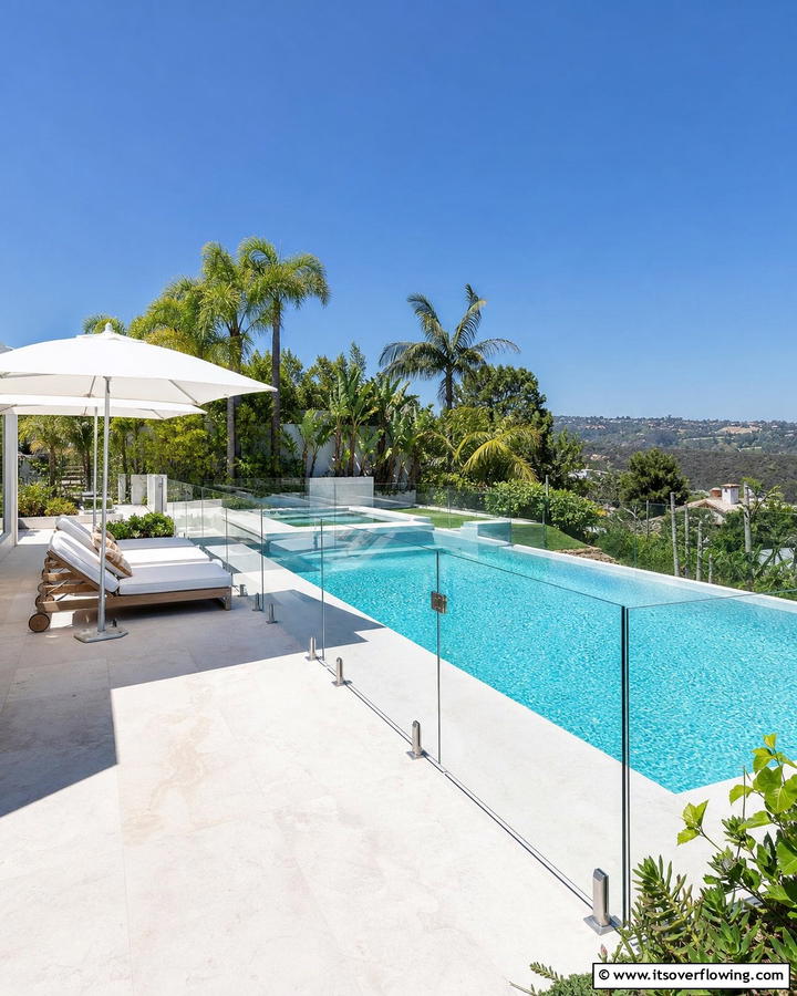 Glass Panel Railings for a Sleek Look - 20 Pool Deck Railing Ideas for Safety and Style