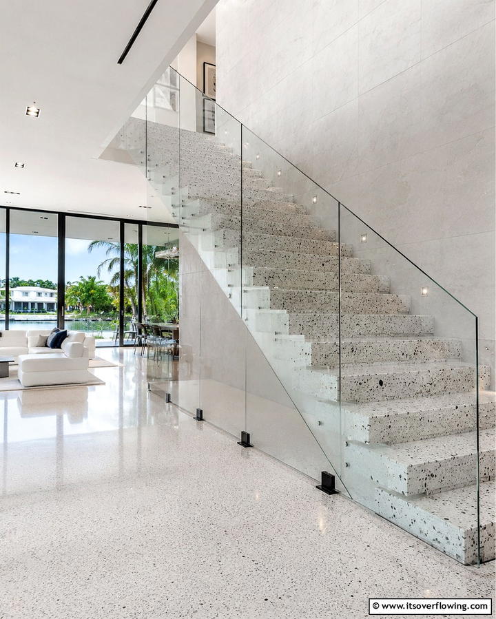 Glass Panels for a Sleek and Open Look - 25 Stair Railing Ideas for Modern and Traditional Homes