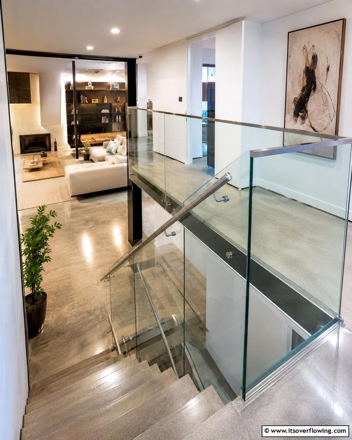 Glass Railing for a Modern Touch - 25 Basement Stair Ideas to Transform Your Space