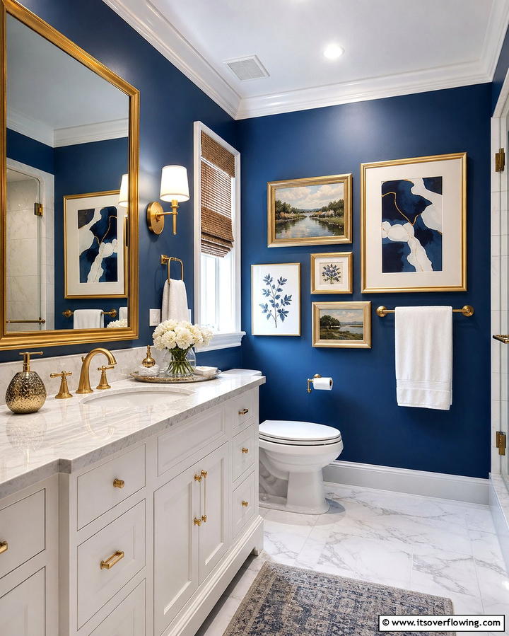 Gold Framed Artwork on Blue Walls - 25 Blue and Gold Bathroom Ideas for a Luxurious Retreat