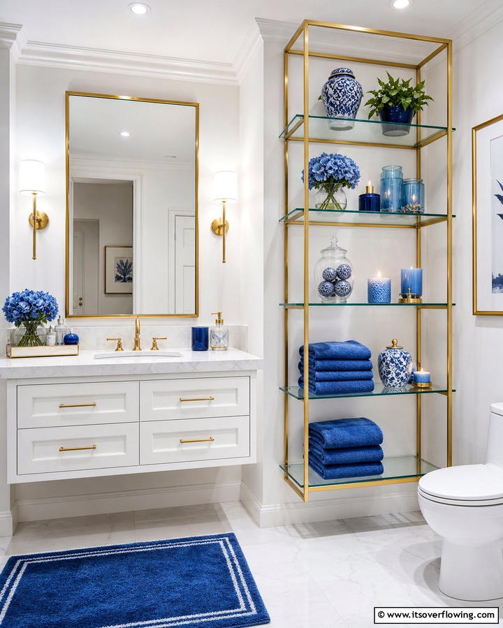 Gold Framed Glass Shelves with Blue Decor - 25 Blue and Gold Bathroom Ideas for a Luxurious Retreat