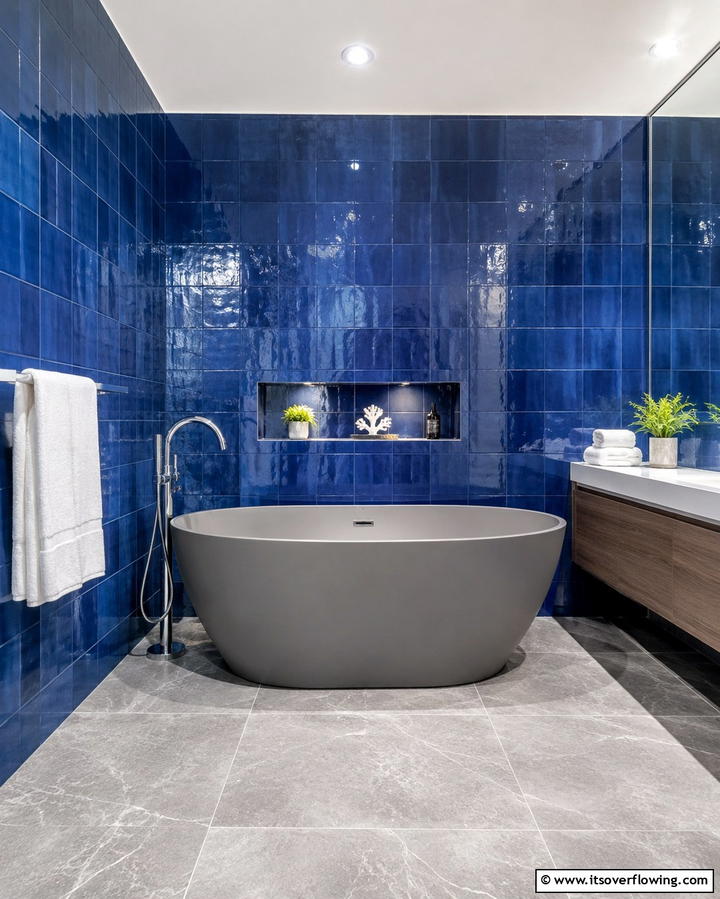 Gray Bathtub with Blue Tile Surround - 25 Blue and Gray Bathroom Ideas for a Modern Look