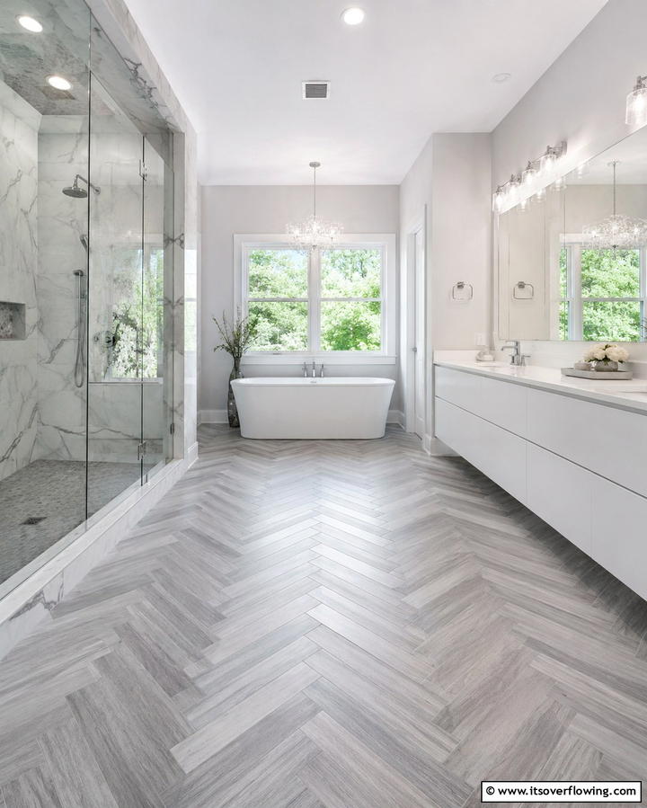 Gray Chevron Flooring for a Bold Statement - 30 Gray Floor Bathroom Design Ideas for Sleek Minimalism