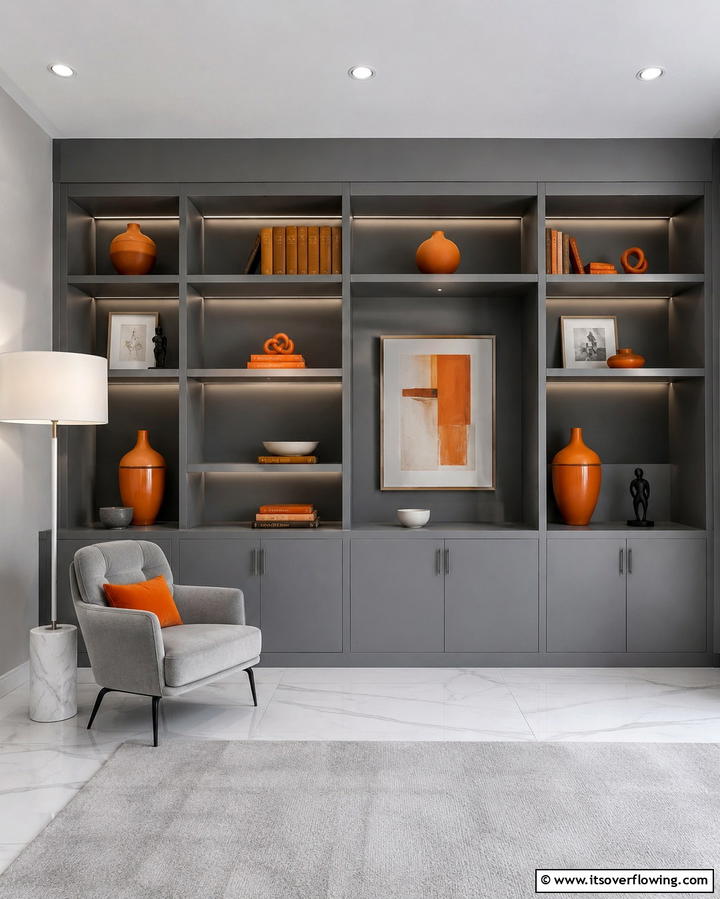 Grey Shelving Units with Orange Decor - 25 Orange and Grey Living Room Ideas for a Modern Look