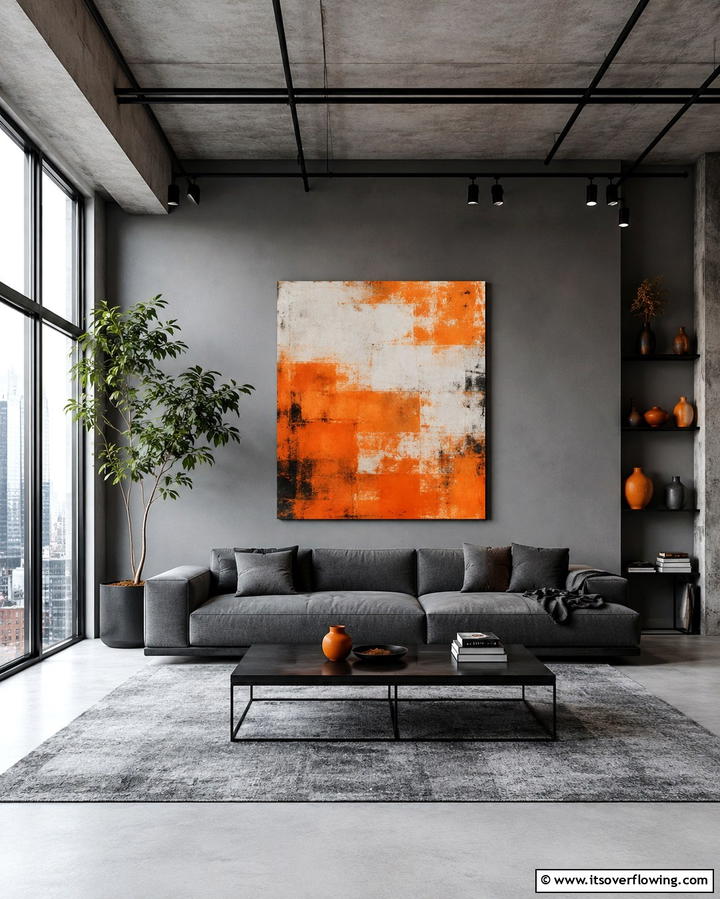 Grey Walls with Orange Artwork - 25 Orange and Grey Living Room Ideas for a Modern Look