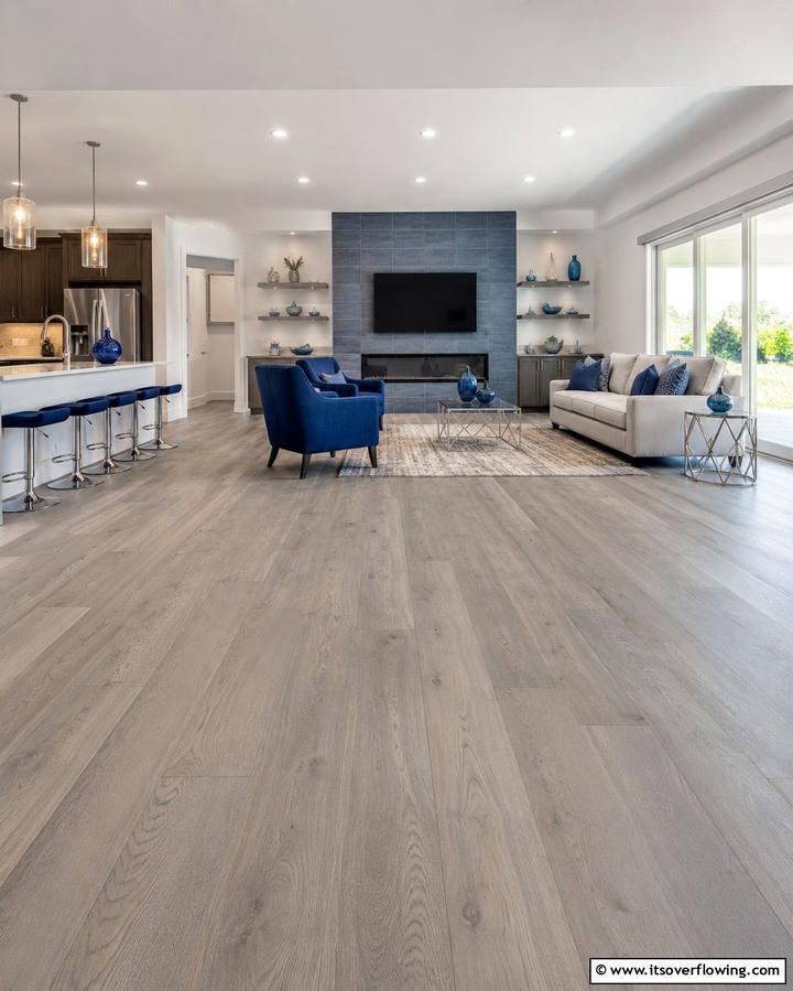 Grey Wooden Flooring with Blue Accents - 30 Soothing Blue & Grey Living Room Designs for Relaxing Spaces