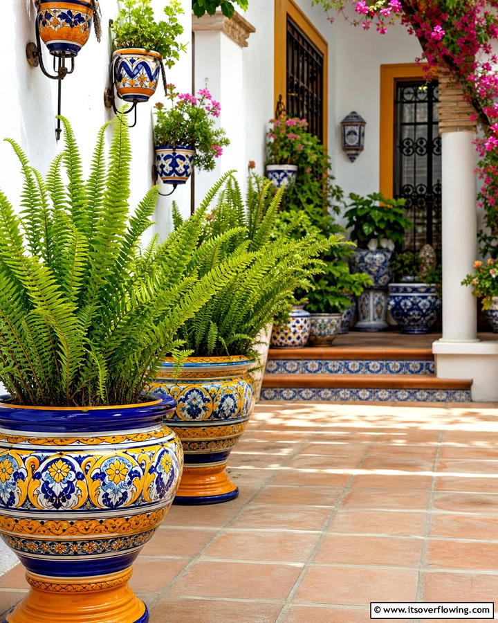 Handcrafted Pottery and Planters - 25 Spanish Courtyard Ideas for a Mediterranean Oasis